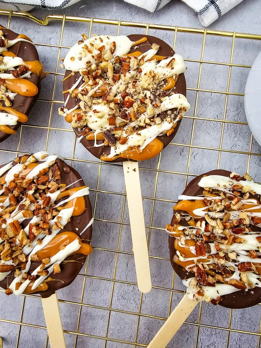Chocolate Covered Caramel Apple Slices | She's Not Cookin'
