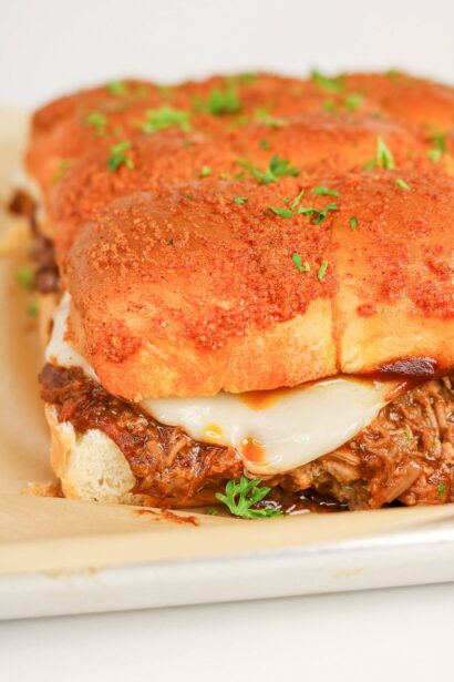 Pulled Pork Sliders With Hawaiian Rolls | She's Not Cookin'