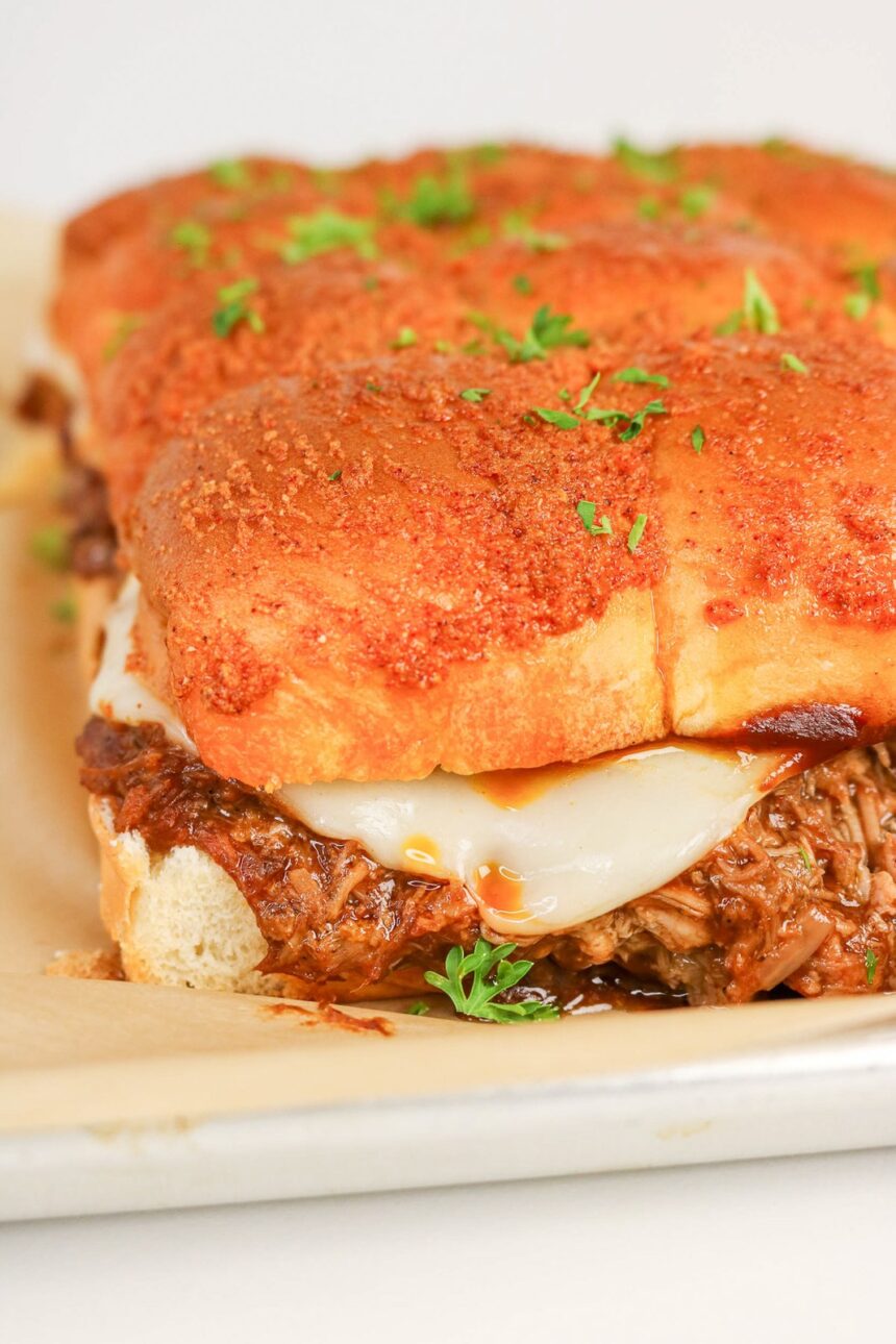 Pulled Pork Sliders With Hawaiian Rolls | She's Not Cookin'